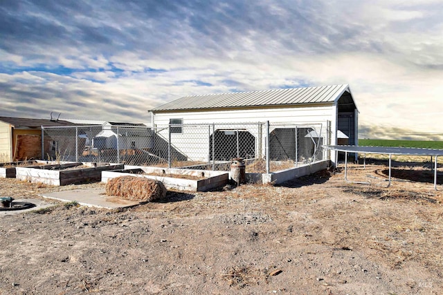 exterior space with an outbuilding and a trampoline