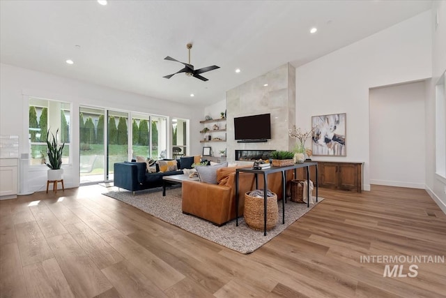 1889 W Winter Camp Ct, Boise, ID 83703 - living area with a ceiling fan, light wood-type flooring, high vaulted ceiling, recessed lighting, and baseboards
