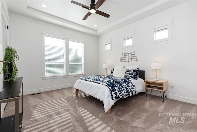 1889 W Winter Camp Ct, Boise, ID 83703 - carpeted bedroom featuring baseboards, a raised ceiling, recessed lighting, and a ceiling fan