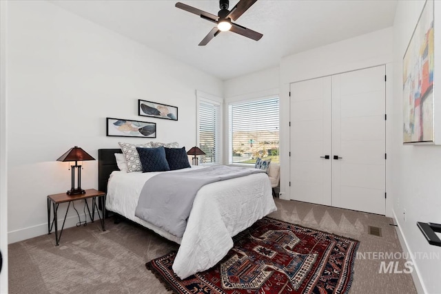 1889 W Winter Camp Ct, Boise, ID 83703 - bedroom featuring carpet floors, baseboards, ceiling fan, and a closet