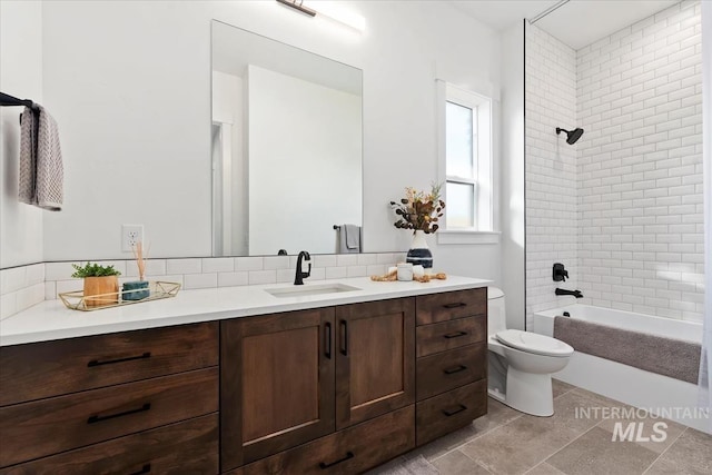 1889 W Winter Camp Ct, Boise, ID 83703 - full bath featuring toilet, vanity, backsplash, shower / bathtub combination, and tile patterned floors
