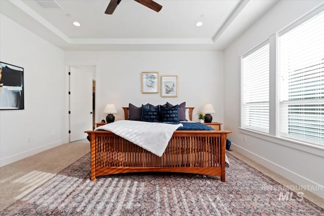 1889 W Winter Camp Ct, Boise, ID 83703 - bedroom with carpet, a raised ceiling, baseboards, ceiling fan, and recessed lighting