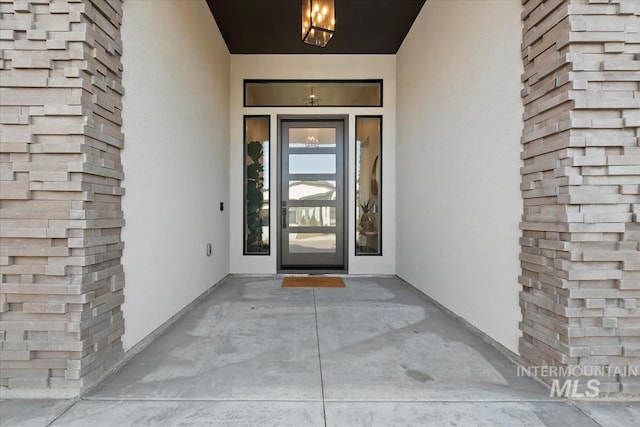 1889 W Winter Camp Ct, Boise, ID 83703 - property entrance featuring stucco siding and a patio