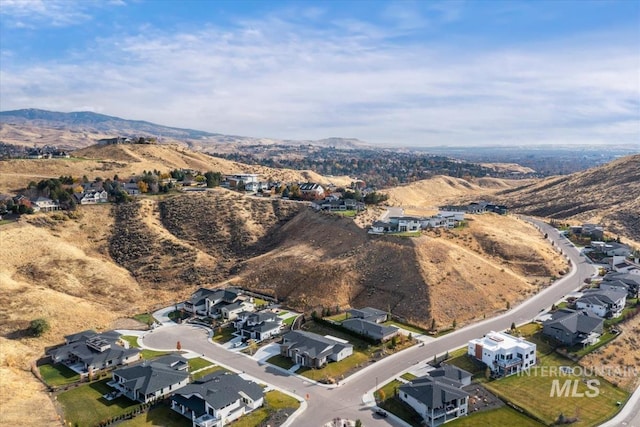 1889 W Winter Camp Ct, Boise, ID 83703 - aerial view of property and surrounding area featuring a mountain backdrop and nearby suburban area