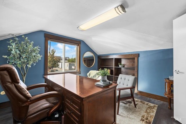 office featuring baseboards, wood finished floors, and lofted ceiling