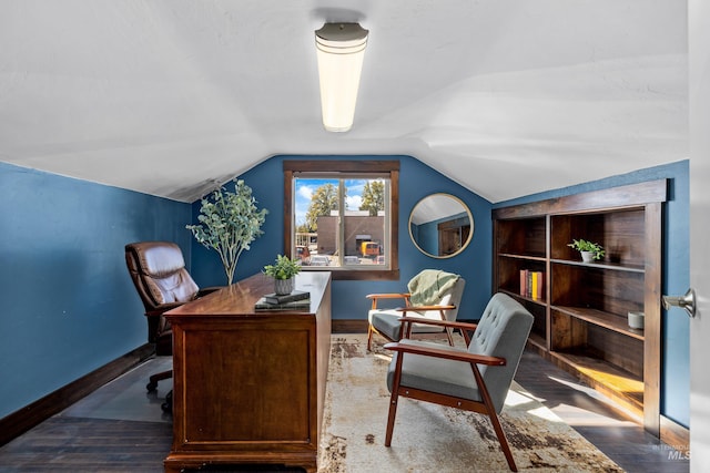 home office with wood finished floors, baseboards, and lofted ceiling