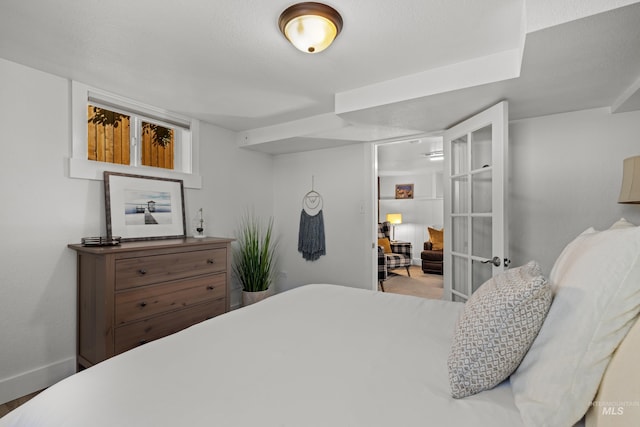 bedroom featuring baseboards