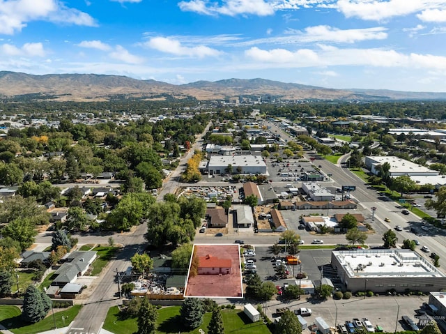 birds eye view of property featuring a mountain view
