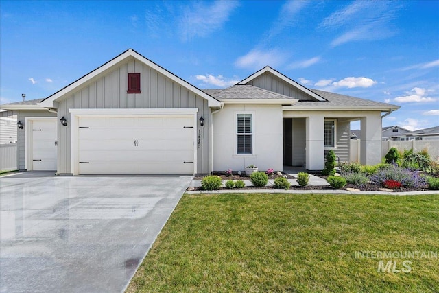 12740 S Alzano Way, Nampa, ID 83686 - ranch-style house featuring an attached garage, board and batten siding, and a front lawn