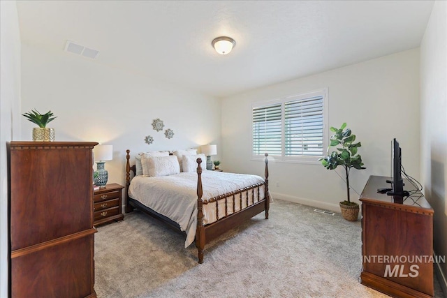 12740 S Alzano Way, Nampa, ID 83686 - bedroom featuring light carpet and baseboards