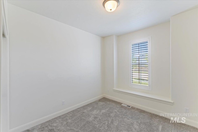 12740 S Alzano Way, Nampa, ID 83686 - empty room featuring carpet floors and baseboards