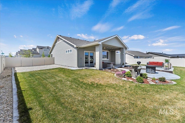 12740 S Alzano Way, Nampa, ID 83686 - rear view of house featuring an outdoor hangout area and a patio