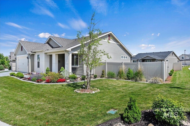 12740 S Alzano Way, Nampa, ID 83686 - view of side of home with a garage and a shingled roof
