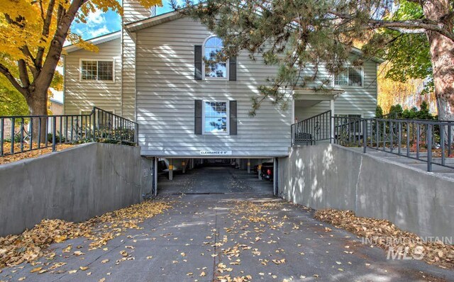 exterior space with a carport