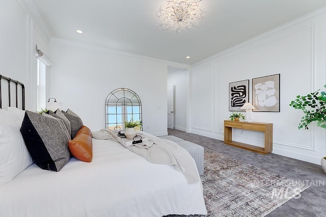 carpeted bedroom with crown molding and a chandelier