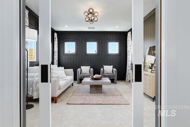 living room featuring light colored carpet