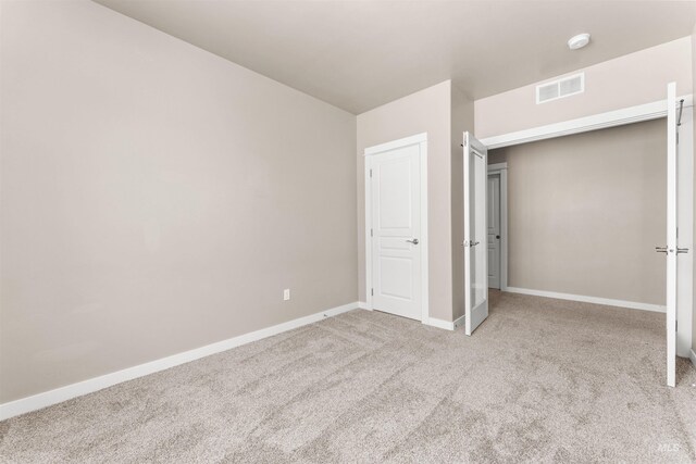 12457 W Awbrey St, Boise, ID 83709 - unfurnished bedroom with carpet flooring and baseboards
