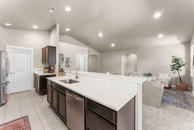 12457 W Awbrey St, Boise, ID 83709 - kitchen featuring stainless steel appliances, open floor plan, lofted ceiling, recessed lighting, and dark brown cabinets