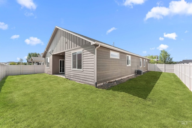 12457 W Awbrey St, Boise, ID 83709 - rear view of house featuring board and batten siding and a fenced backyard