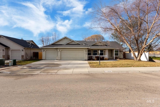 single story home with a front lawn and a garage