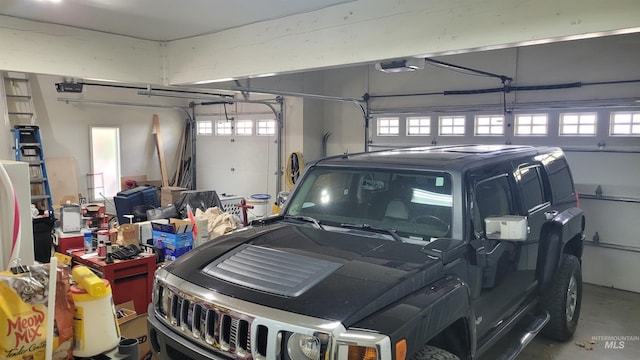 garage featuring a garage door opener