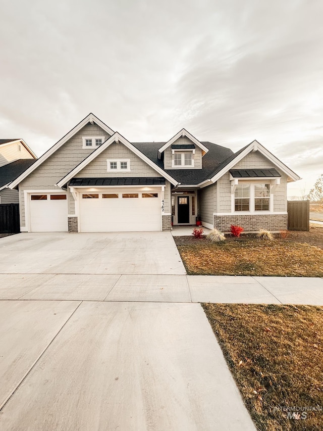 craftsman inspired home with a garage