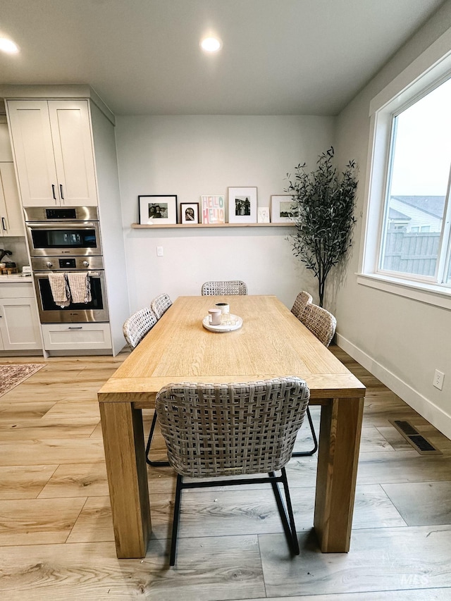 dining area featuring light hardwood / wood-style flooring