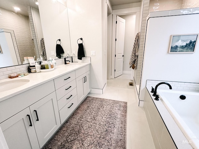 bathroom featuring tile patterned flooring, vanity, and shower with separate bathtub