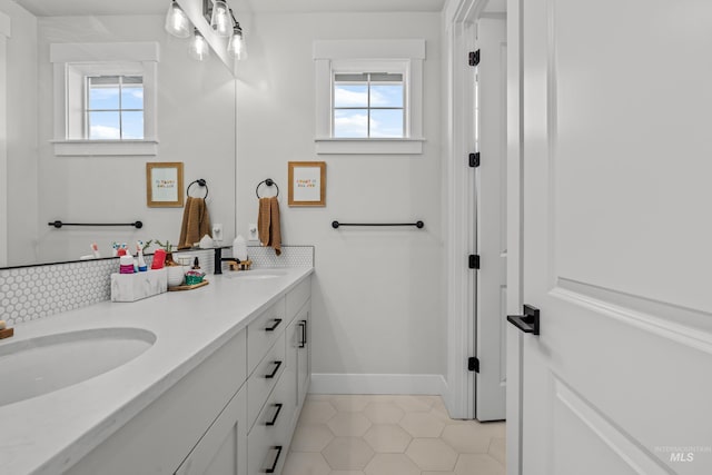 bathroom with vanity and tile patterned floors