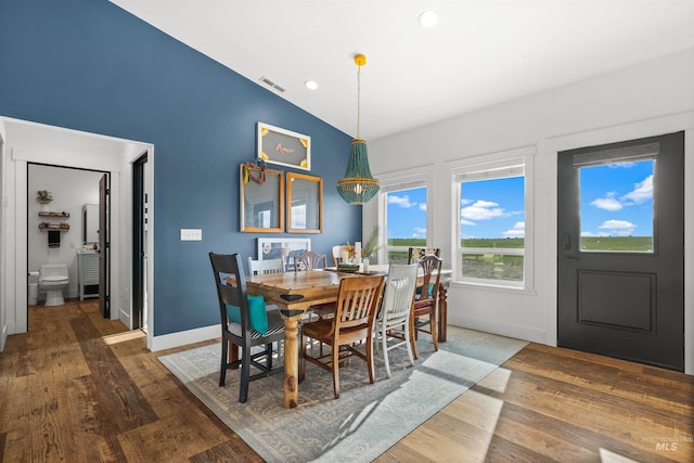 1400 Texas Ridge Rd, Deary, ID 83823 - dining space with visible vents, baseboards, wood finished floors, and lofted ceiling