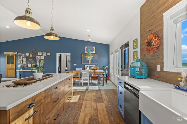 1400 Texas Ridge Rd, Deary, ID 83823 - kitchen featuring vaulted ceiling, dark wood finished floors, stainless steel dishwasher, pendant lighting, and a sink