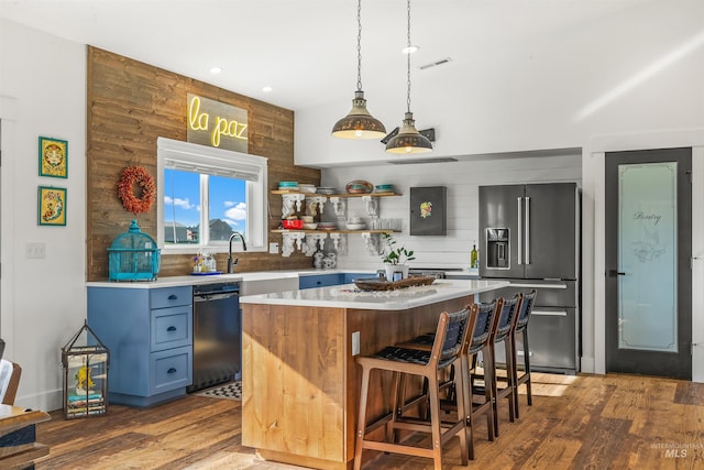 1400 Texas Ridge Rd, Deary, ID 83823 - kitchen featuring wood finished floors, dishwasher, a sink, and high end fridge