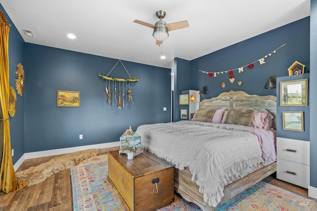 1400 Texas Ridge Rd, Deary, ID 83823 - bedroom with visible vents, baseboards, a ceiling fan, and wood finished floors