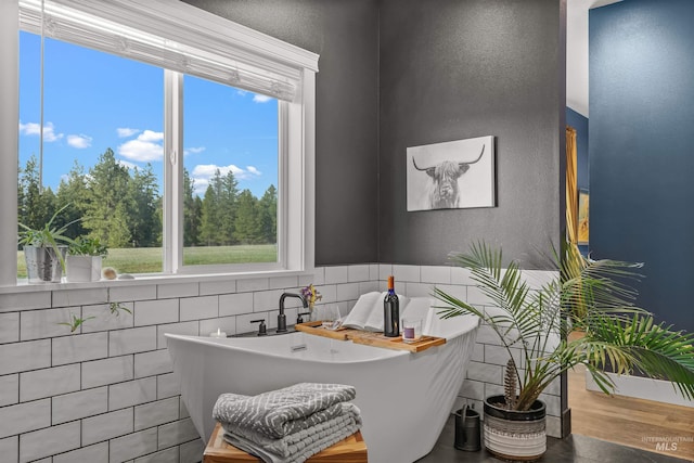 1400 Texas Ridge Rd, Deary, ID 83823 - full bathroom with a textured wall and a soaking tub