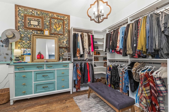 1400 Texas Ridge Rd, Deary, ID 83823 - spacious closet featuring a notable chandelier and wood finished floors