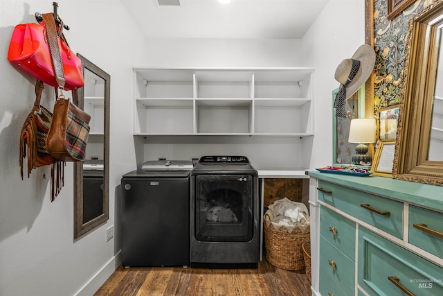 1400 Texas Ridge Rd, Deary, ID 83823 - washroom with laundry area, washing machine and clothes dryer, baseboards, and dark wood-style flooring