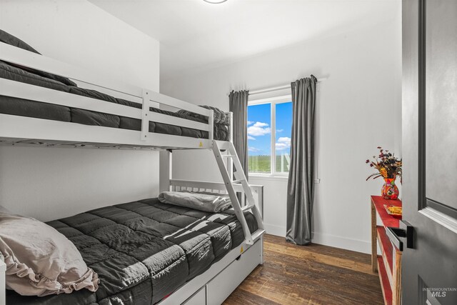 1400 Texas Ridge Rd, Deary, ID 83823 - bedroom with baseboards and dark wood finished floors