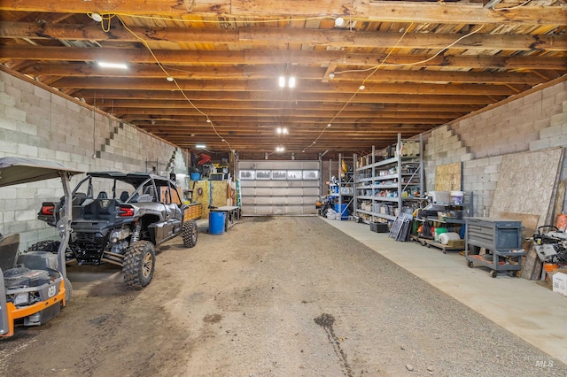 1400 Texas Ridge Rd, Deary, ID 83823 - garage featuring concrete block wall