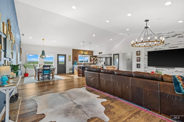 1400 Texas Ridge Rd, Deary, ID 83823 - living room featuring wood finished floors, a notable chandelier, vaulted ceiling, and recessed lighting