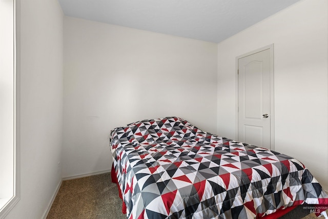 12798 King Rd, Kendrick, ID 83537 - carpeted bedroom featuring baseboards