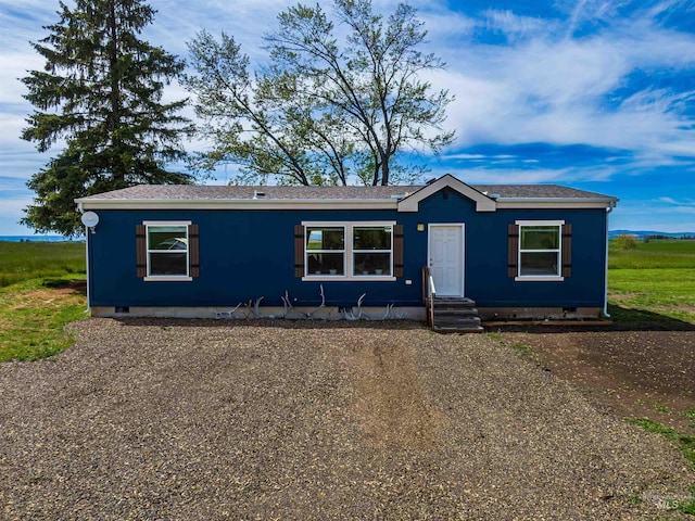 12798 King Rd, Kendrick, ID 83537 - view of front of home featuring crawl space, entry steps, and a shingled roof