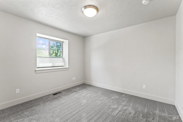 18277 N Streams Edge Way, Boise, ID 83714 - carpeted spare room featuring a textured ceiling and baseboards