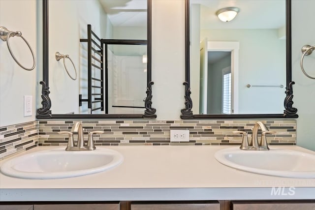full bathroom featuring backsplash and vanity