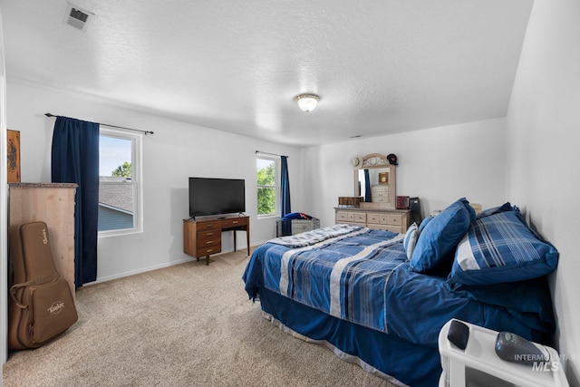 1056 S Hebgon Lake Ave, Middleton, ID 83644 - bedroom featuring light colored carpet and a textured ceiling