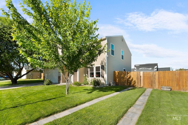 1056 S Hebgon Lake Ave, Middleton, ID 83644 - obstructed view of property featuring driveway and a garage