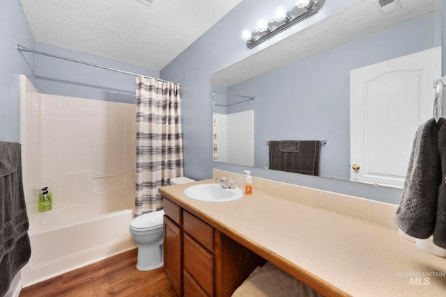 1056 S Hebgon Lake Ave, Middleton, ID 83644 - bathroom with wood finished floors, shower / bath combo, and vanity