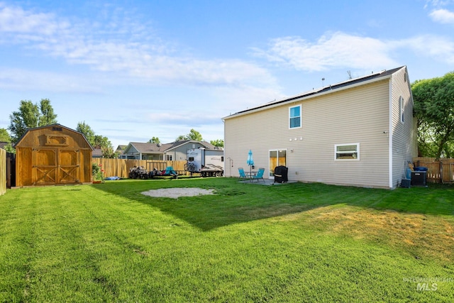 1056 S Hebgon Lake Ave, Middleton, ID 83644 - rear view of property featuring a fenced backyard and a storage shed