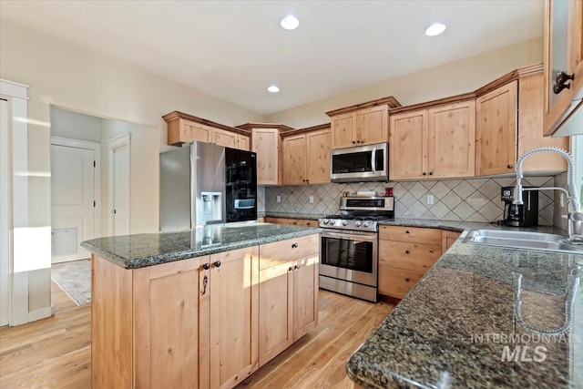 3052 N Christian Way, Meridian, ID 83646 - kitchen with stainless steel appliances, light brown cabinetry, light wood-style floors, and recessed lighting