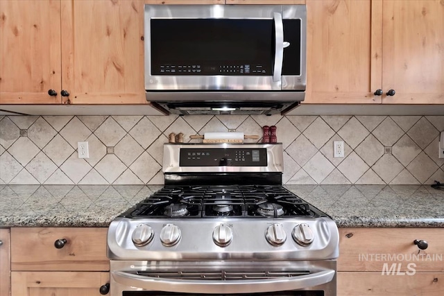 3052 N Christian Way, Meridian, ID 83646 - kitchen featuring stainless steel appliances, light brown cabinetry, decorative backsplash, and stone countertops