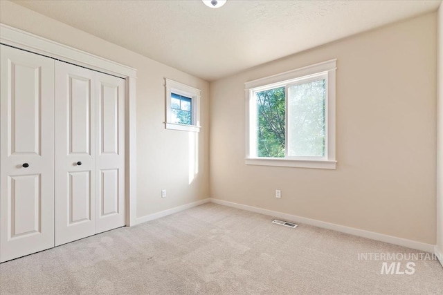 3052 N Christian Way, Meridian, ID 83646 - unfurnished bedroom featuring carpet and a closet